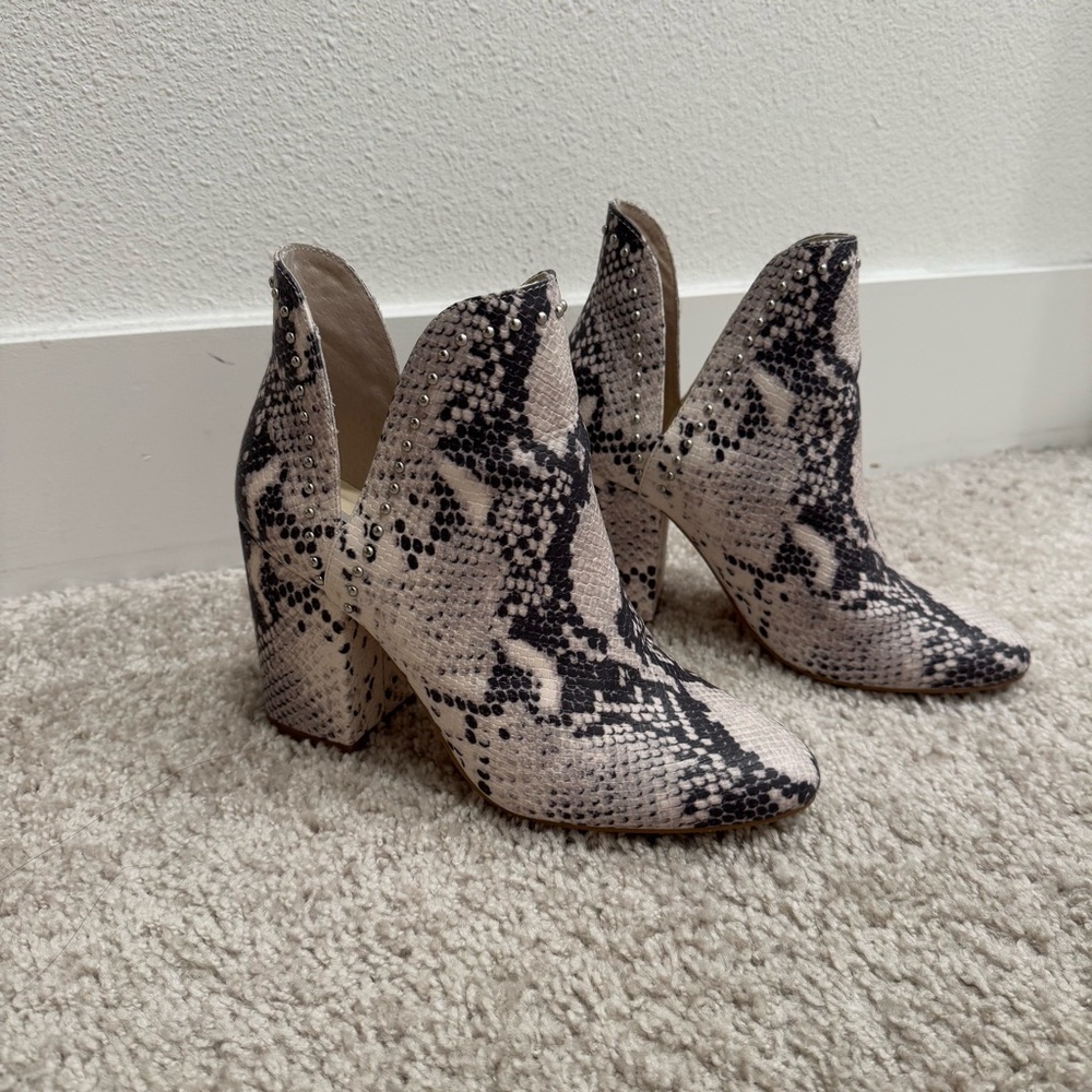 Steve Madden “Rockstar” black and white snake print heeled booties